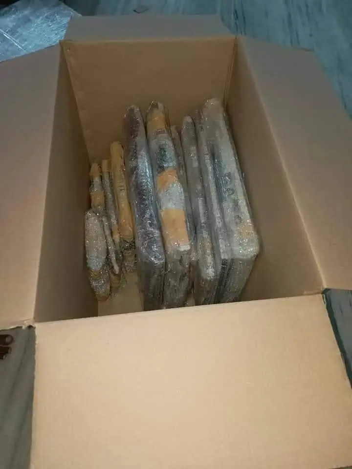 An open carton filled with individually wrapped items