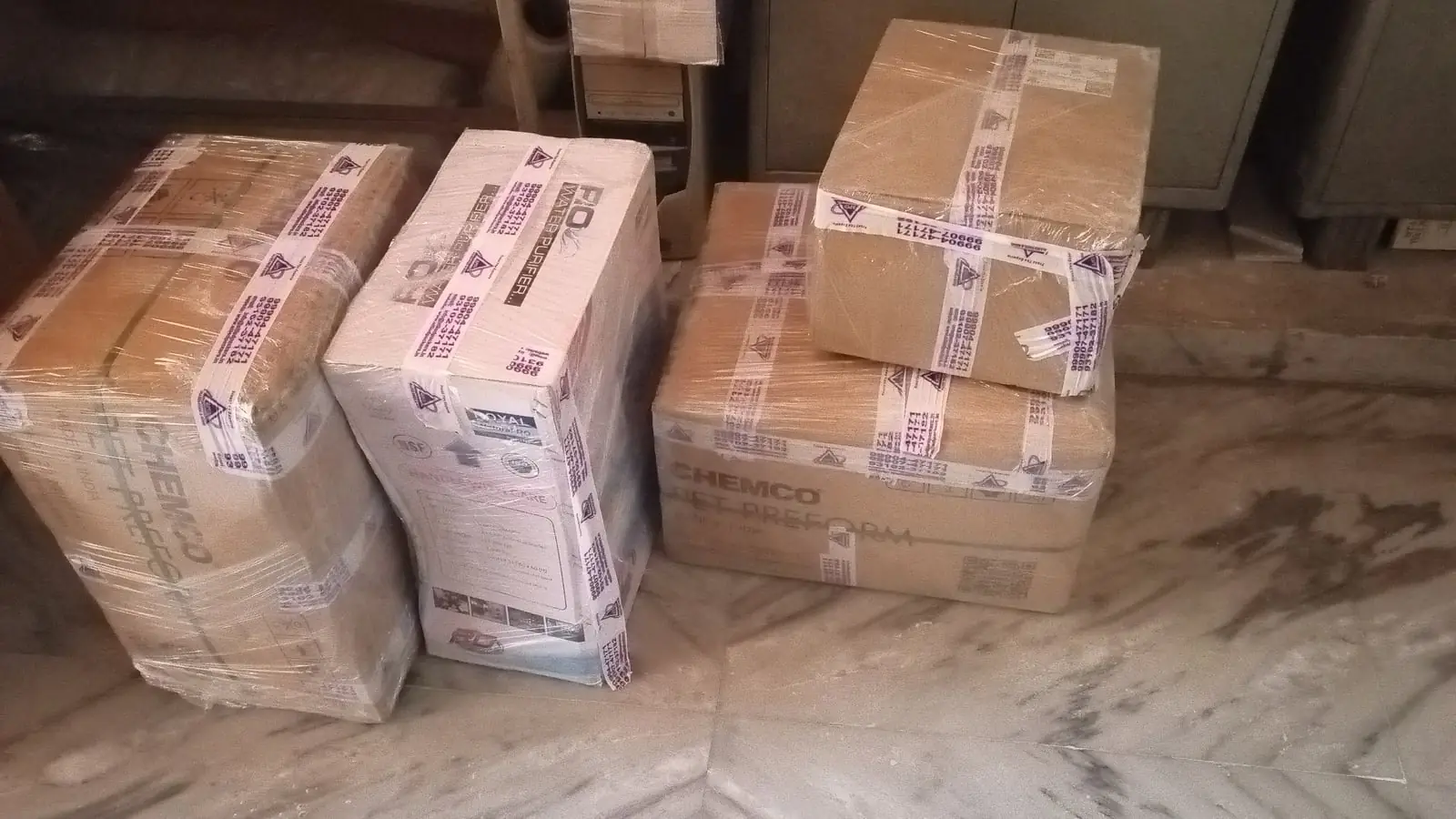 Cartons sealed with printed packing tape